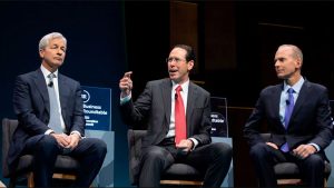 JPMorgan Chase CEO Jamie Dimon, AT&T CEO Randall Stephenson and Boeing CEO Dennis Muilenberg speak during the Business Roundtable (BRT) CEO Innovation Summit in Washington, D.C., on December 6, 2018. Since its inception, BRT has been at the forefront of corporate resistance to pro-consumer, pro-union legislative efforts.