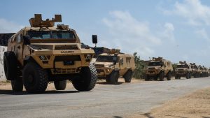 A convoy of AFRICOM's armored vehicles drive to the Uganda People’s Defence Force compound in Mogadishu, Somalia