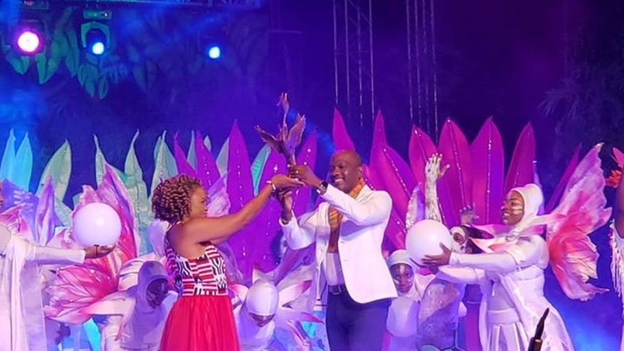 Antigua and Barbuda Culture Minister Daryll Matthew accepts the Carifesta baton from T&T Culture Minister Dr Nyan Gadsby-Dolly.