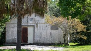 The Button, a former juke joint, sits in disrepair in the Snowden Community in Mount Pleasant, S.C. Such settlements were built by former slaves to be self-sufficient and to repel Ku Klux Klan attacks.