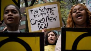 Activists rally in support of proposed "Green New Deal" legislation outside of Senate Minority Leader Chuck Schumer's New York City office, April 30, 2019, in New York City.