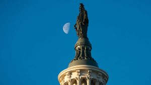 The Statue of Freedom atop the Capitol.