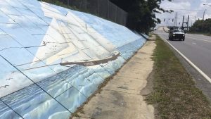 Mural of the slave ship Clotilda along Africatown Blvd