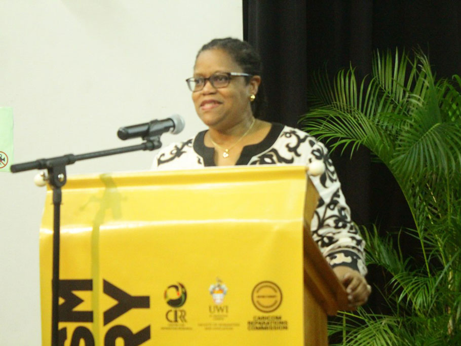 Programme Manager, Culture and Community Development at the CARICOM Secretariat, Dr. Hilary Brown, speaking at the opening of the symposium.