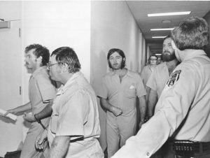 A group of the Klansmen and Nazis who faced murder charges for the Greensboro shooting, photographed before an arraignment hearing in 1979.