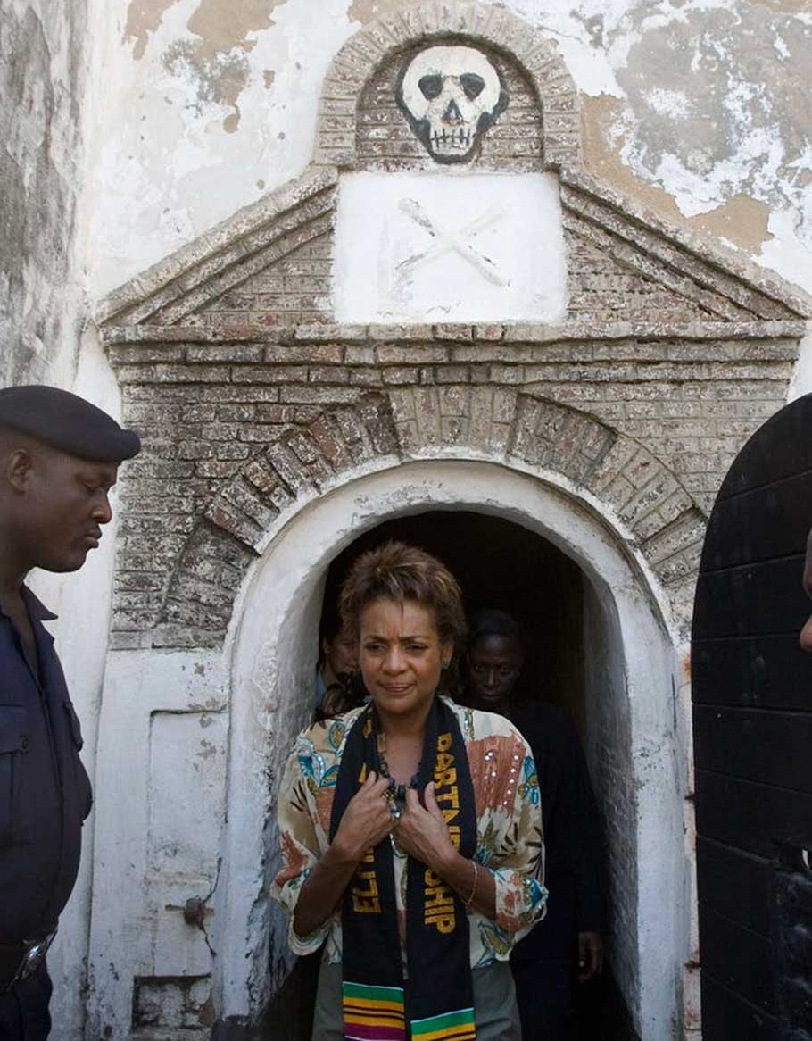 Michaëlle Jean leaves a room at Elmina Castle in Ghana