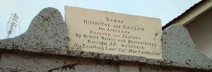 he sign above the Asylum, Kings Gate, Freetown, Sierra Leone.