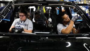 Assembly line workers put final touches on 2018 Ford Expedition SUV at the Ford Kentucky Truck Plant in Louisville, Ky