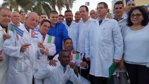 Cuban doctors prepare to leave for Italy to provide medical aid.