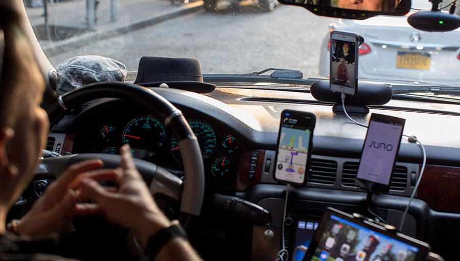 A driver for multiple ride-share companies with several devices on at once in New York, June 7, 2018.