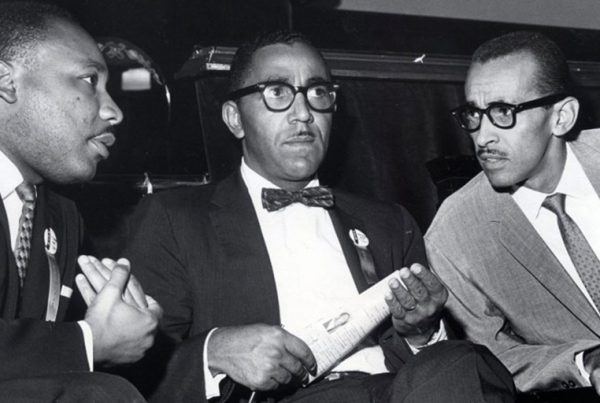 The Rev. Martin Luther King Jr., left, meets with the Rev. Joseph E. Lowery, center, and the Rev. Wyatt Tee Walker at First African Baptist Church in Richmond, Va., for the Southern Christian Leadership Conference convention on Sept. 25, 1963.