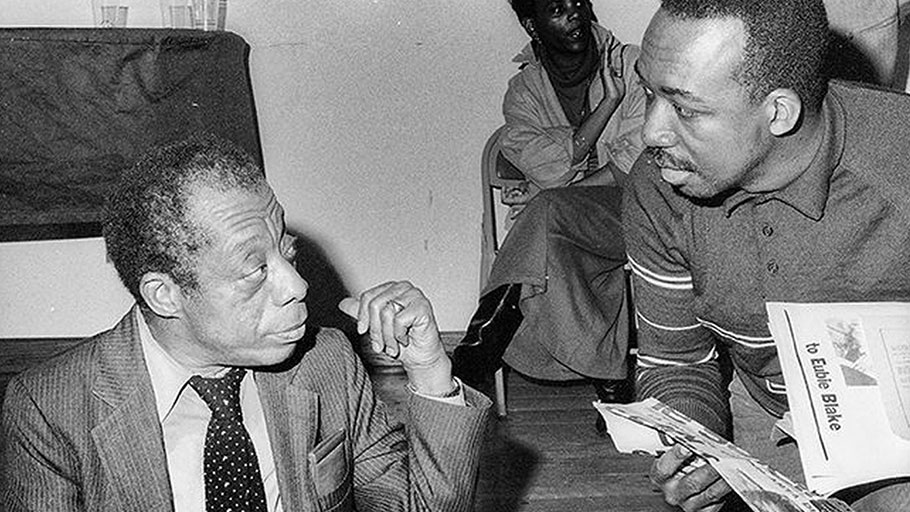 The novelist and essayist James Baldwin (seated) talks to James G. Spady at the African American Museum in Philadelphia in March 1986.