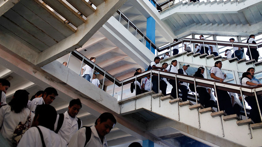 Med students walk down the stairways after classes at the Latin American School of Medicine in Havana.