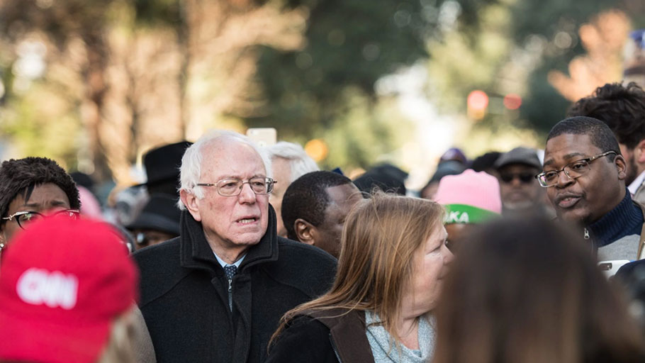 Democratic presidential candidate Sen. Bernie Sanders (I-VT) (2nd L) marches in the King Day at the Dome parade January 18, 2016 in Columbia, South Carolina. 