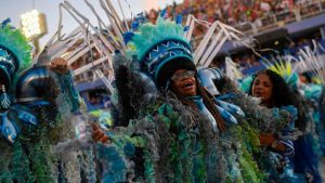 A member of the Portela samba school performs during the first night of Rio’s carnival parade at the Sambadrome Marquês de Sapucaí.