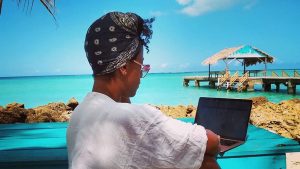 Tiffanie Drayton working on Pigeon Point beach, Trinidad and Tobago, in January 2020