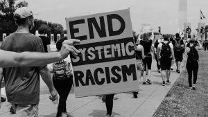 People march towards the Washington Monument at the Black Lives Matter protest in Washington DC 6/6/2020