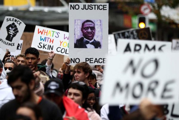 Protestors march down Queen Street in Auckland, New Zealand on Monday, June 1.