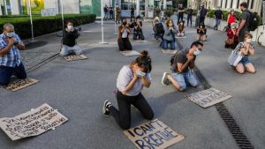 A flash mob gathers outside the American consulate in Milan, Italy on Thursday, May 28.