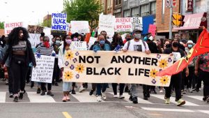 Protesters chanting slogans during a rally in Toronto on Saturday, May 30.