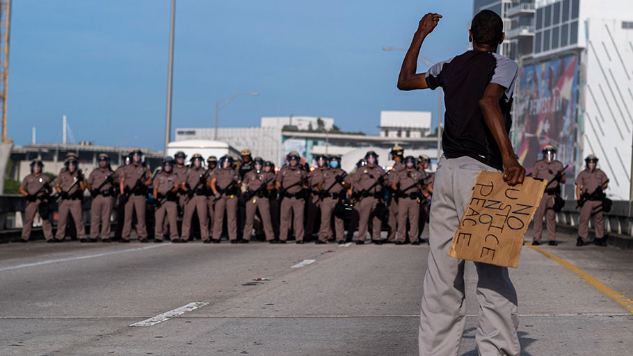 Florida state troopers at a rally in response to the recent death of George Floyd in Miami, Florida on May 31, 2020. 