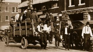 Injured and wounded prisoners are taken to hospital under guard after the Tulsa, Oklahoma race riots in 1921 when up to 300 African-Americans were massacred by white mobs