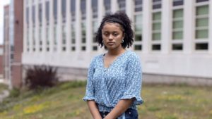 Fiona Akilo Stawarz poses for a portrait outside South Portland High School, where she will be a senior in the fall. Akilo Stawarz helped organize a Black Lives Matter protest in South Portland in June and is also involved in fighting racism and inequity at her school.