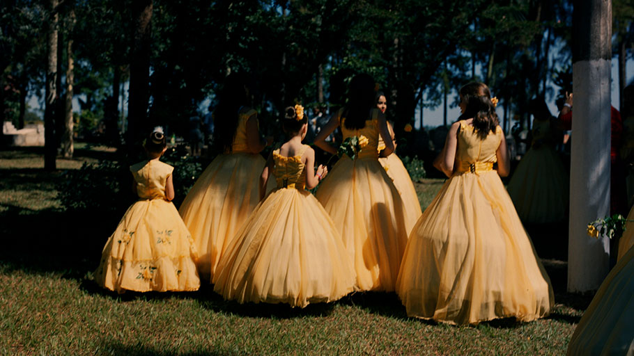 Folk dancers gather before performing at the 2018 Confederate Festival in Santa Bárbara d’Oeste, Brazil. Each of their dresses is embroidered with the name of a state in the U.S. Confederacy.
