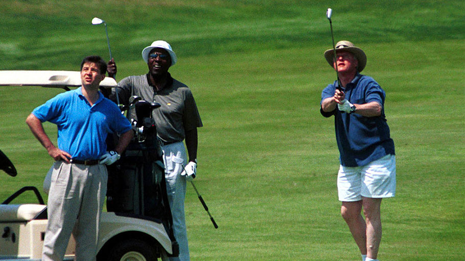Bill Clinton golfing with his wealthy friends on August 5, 2000, in Martha's Vineyard, MA.