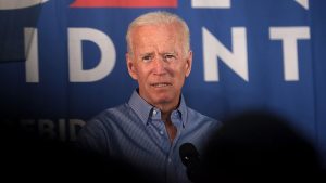 Former vice president Joe Biden speaking with supporters at a community event in Iowa, 2019.