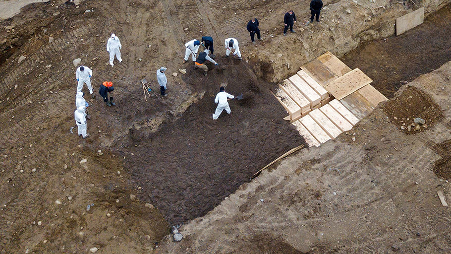 Bodies are buried on New York's Hart Island amid the coronavirus outbreak in New York City, on Apr. 9, 2020.