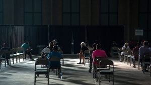 People await help with unemployment claims at an event in Tulsa, Okla., on July 24.