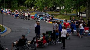 People line up outside Kentucky Career Center to find assistance with their unemployment claims in Frankfort, Kentucky, U.S. June 18.