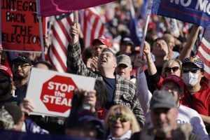 trump-supporters-rally-dc-proud-boys-910x512