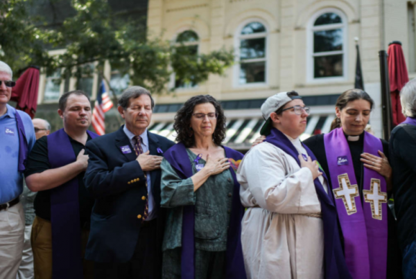 clergy-praying-vigil-white-violence-910x512