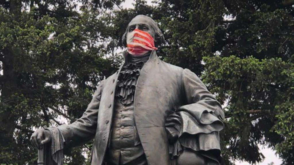 Masked George Washington statue.