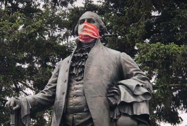 Masked George Washington statue.