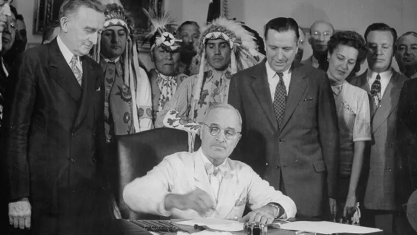 President Harry S. Truman signing a bill providing for the establishment of the Indian Claims Commission.