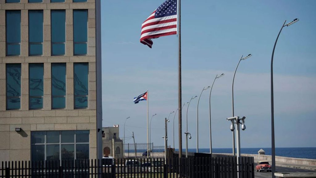 A view of Cuban and U.S. flags beside the U.S. Embassy in Havana, Cuba, December 15, 2020.
