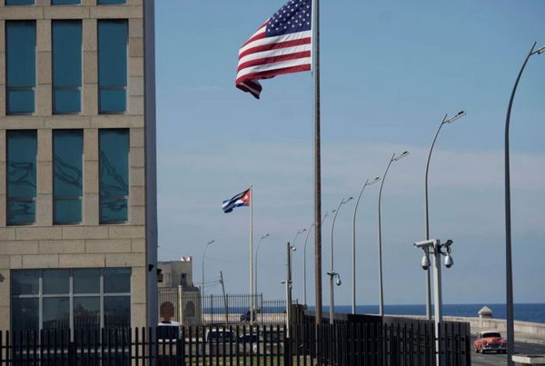 A view of Cuban and U.S. flags beside the U.S. Embassy in Havana, Cuba, December 15, 2020.