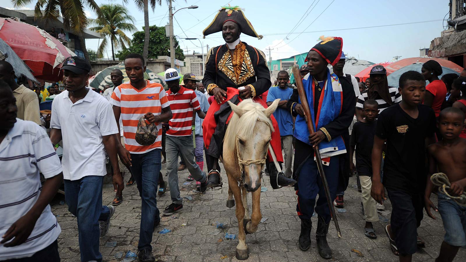 A man dressed as the hero of Haiti’s independence, Jean-Jacques Dessalines, marches during an anti-government protest in 2014. 