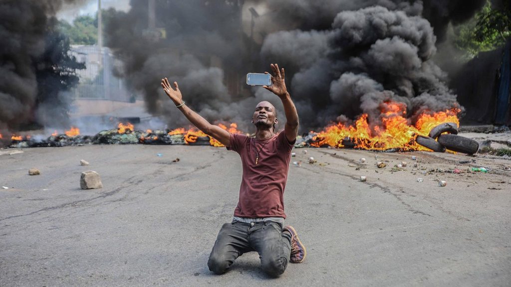 A man participates in a general strike in Port-au-Prince, Haiti, on Oct. 18 in protest of the country’s rapidly disintegrating security situation highlighted by the recent kidnapping of American and Canadian missionaries