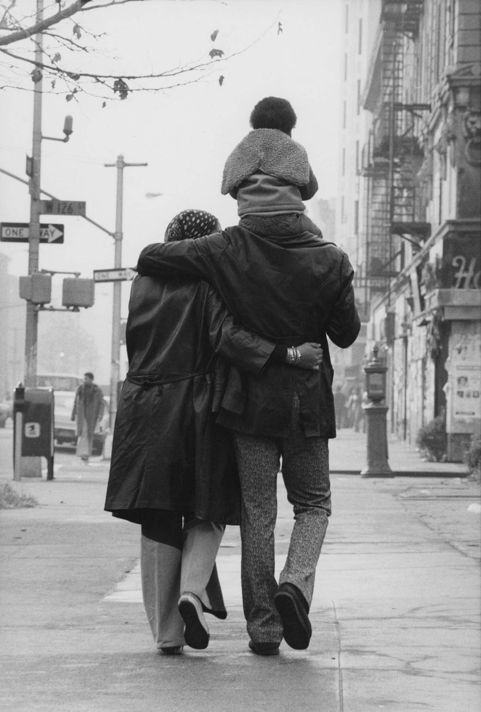 “Young Family Strolling, Harlem,” 1972.