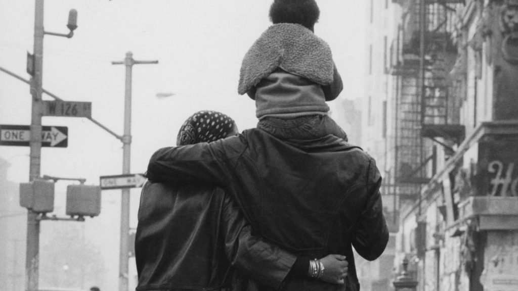“Young Family Strolling, Harlem,” 1972. Photographs by Chester Higgins