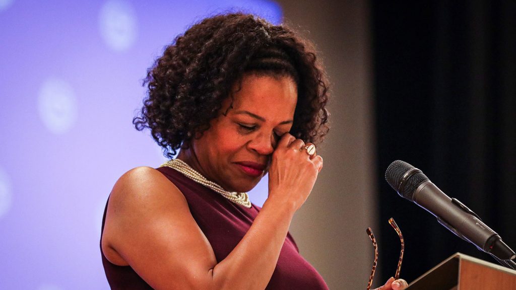 Mayor Kim Janey wipes away tears