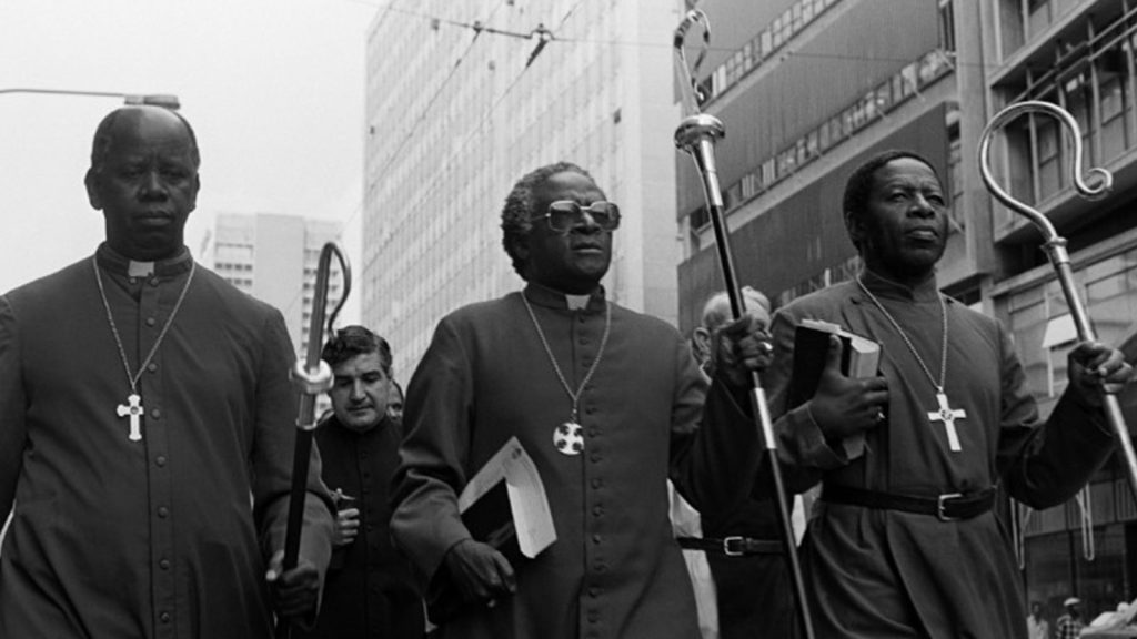 Desmond Tutu leads clergymen through Johannesburg in April 1985.