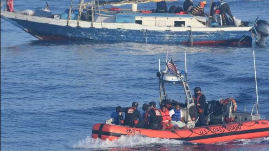 Coast Guard Cutter Venturous' small boat crew ferries Haitians voluntarily wanting to leave an unsafe vessel to the cutter, approximately 17 miles northeast of Punta Maisi, Cuba, April 9, 2022. The people were repatriated to Haiti on April 12, 2022.