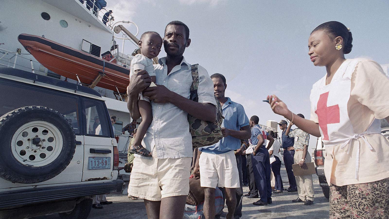 Haitian refugees who were intercepted by the U.S. Coast Guard returning to Port-au-Prince after being repatriated in 1992. 