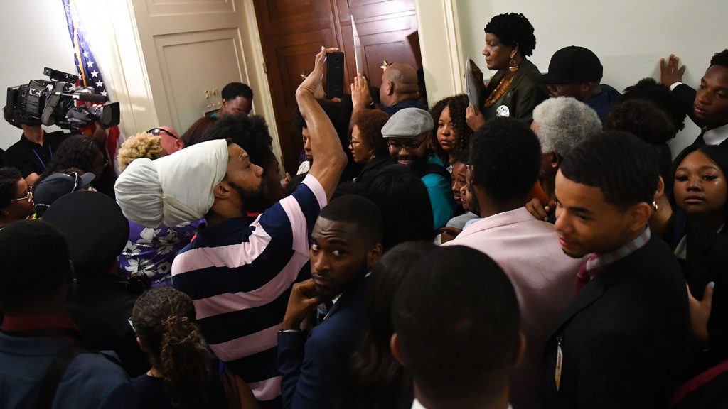 People jam the hallways of the Rayburn House Building to get into a reparations hearing on June 19, 2019, in Washington.