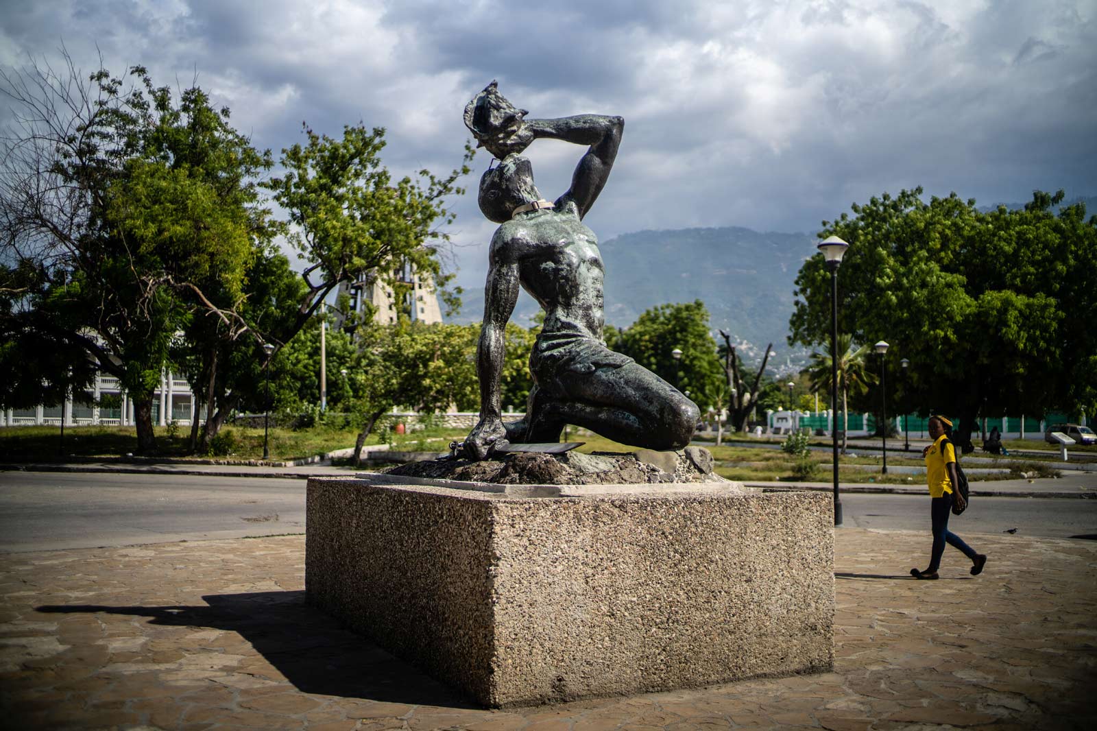 Nèg Mawon, a statue in the main square of Port-au-Prince, depicts a man who has escaped slavery and is blowing a conch shell to rally rebels. 